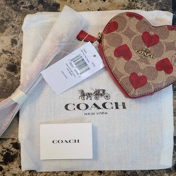 Heart Wristlet In Signature Canvas With Heart Print - Picture 3 of 10